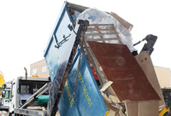 Skip Hire in Ongar unloading a skip at the transfer station