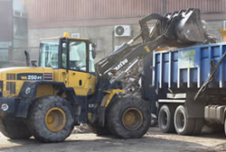 Skip Hire in Ongar loading a lorry